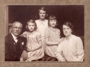 My mother - Ruth Norrington is the one nearest grandpa.  I think it must have been taken about 1930.