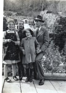 Olga (second from right) with foster father, sister, and another Italian refugee girl